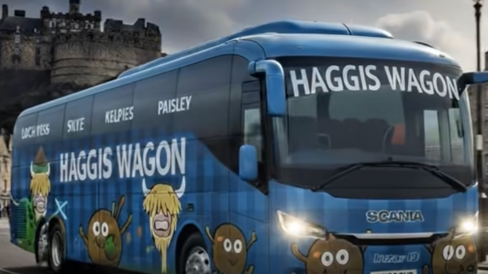 A blue coach branded “Haggis Wagon” drives through Edinburgh with Edinburgh Castle visible in the background. The vehicle is decorated with tartan patterns, cartoon haggis characters and Scottish-themed illustrations, with route names including “Loch Ness,” “Skye,” “Kelpies” and “Paisley” displayed along the side.