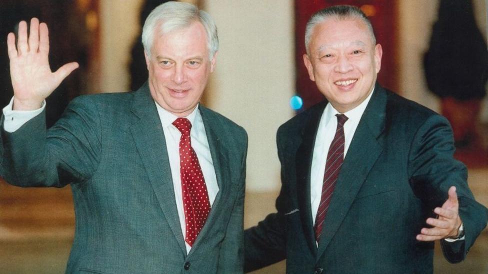 Chris Patten and Tung Chee-hwa (right)