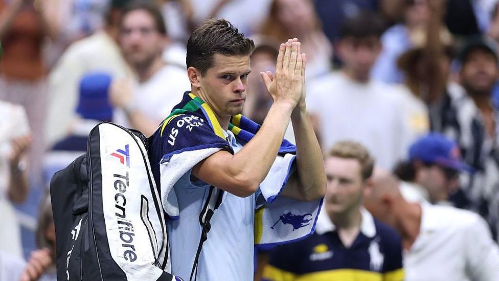 Alexander Blockx of Belgium acknowledges the crowd after losing to Karen Khachanov