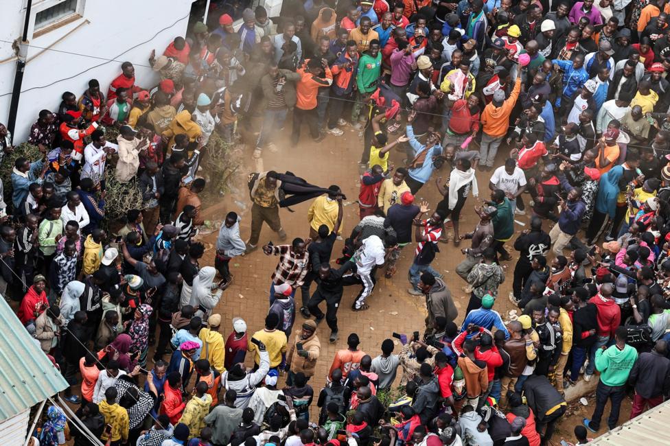 Burundian nationals, some with their belongings, gather at their embassy to get their laissez-passer documents to facilitate their return to Burundi, in Nairobi, Kenya, 09 September 2026.