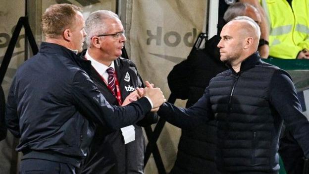 Hearts head coach Wouter Vrancken and Hibs counterpart David Gray shake hands
