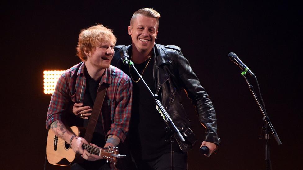 Singer/songwriter Ed Sheeran (L) and rapper Macklemore perform during the 2014 iHeartRadio Music Festival at the MGM Grand Garden Arena on September 20, 2014 in Las Vegas, Nevada.