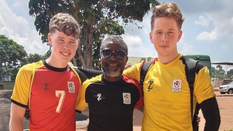 The Fisher brothers with Uganda Under-20s head coach and former Hearts player Laryea Kingston