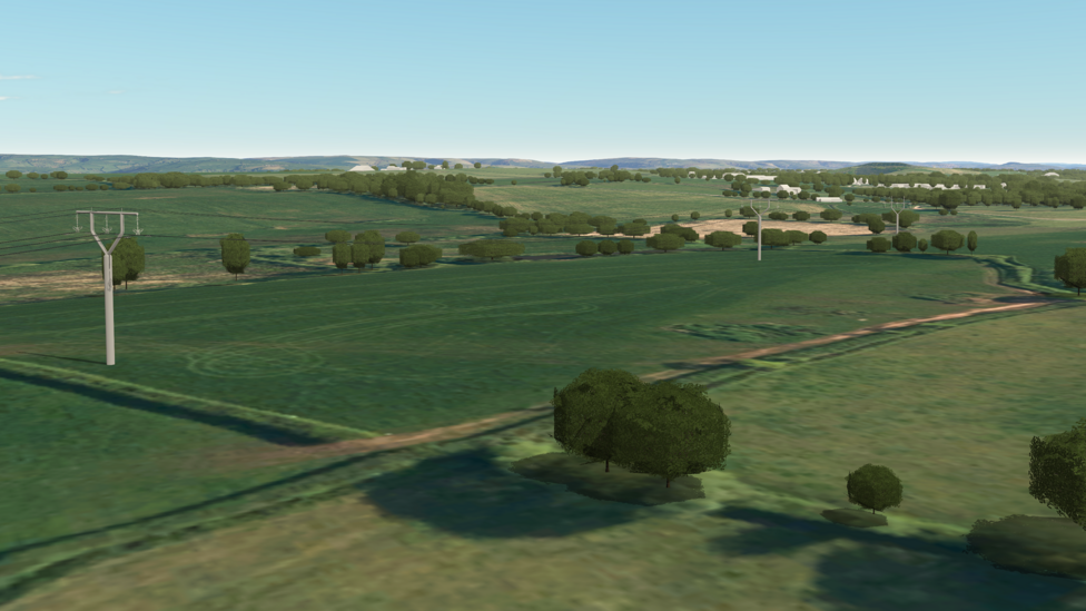 A computer simulated image of what a line of Green GEN Cymru's new monopoles could look like. The single white pole with two arms branching off at the top are placed at intervals within a landscape of green fields.