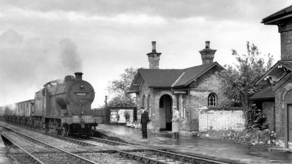 A restored black and white photograph of Bleasby railway station. 