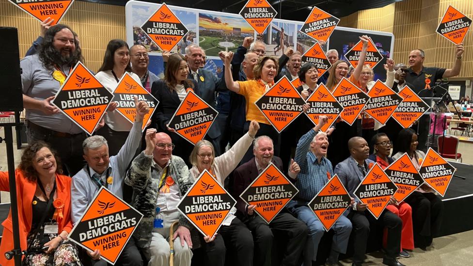 Lib Dem activists celebrate winning in the local elections in Milton Keynes
