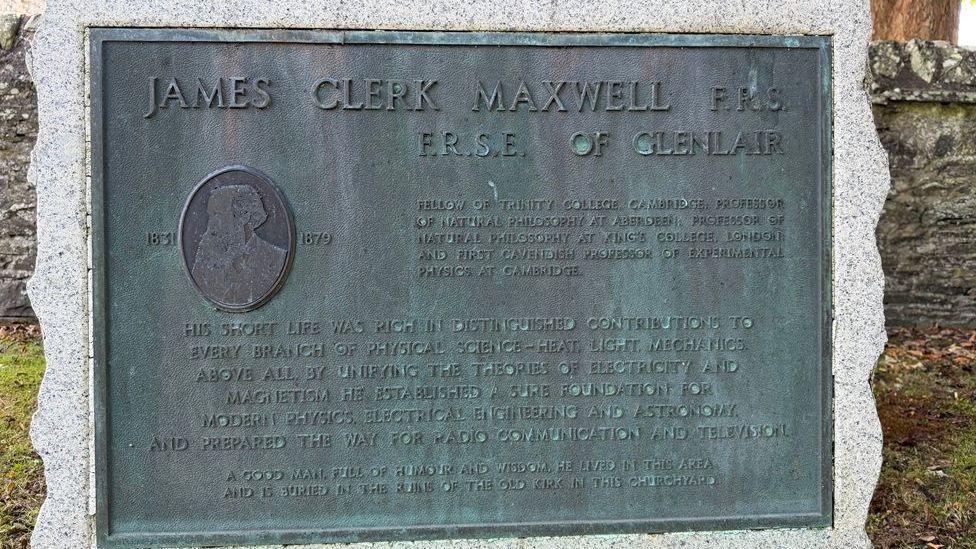 A plaque in honour of James Clerk Maxwell recognising his work in preparing the way for radio communication and television. He is described as a "good man, full of humour and wisdom".