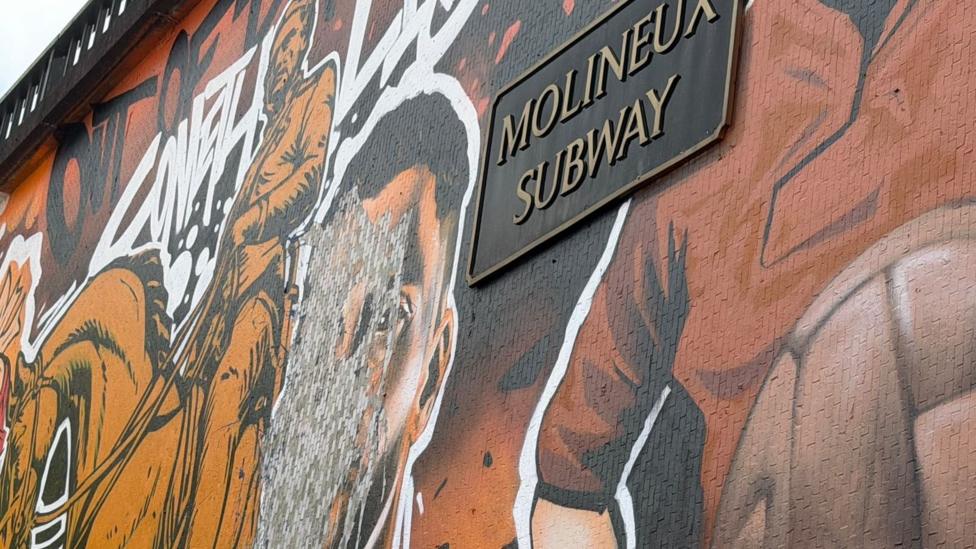 A vandalised mural