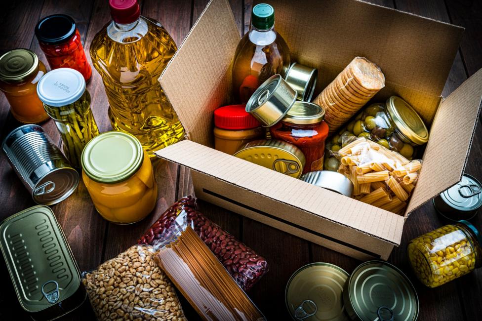 Assortment of food items including oils, pasta and dried foods