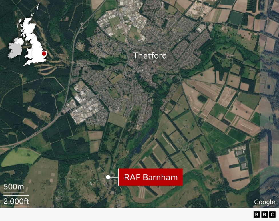 Satellite map showing Thetford, Norfolk, surrounded by farmland and woodland. A locator inset highlights the town’s position within England. RAF Barnham is marked south of Thetford, with roads, industrial areas, and a distance scale visible.