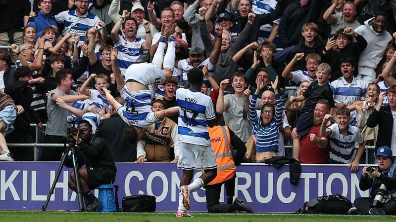 Paul Smyth performs a backflip after equalising for QPR against Preston