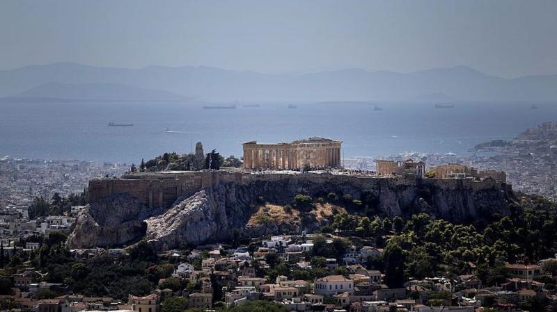 The Parthenon in Athens. The ancient structure is on a hill above the wider city