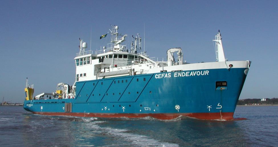 A blue and white ship with the name cefa endeavour written on the bow