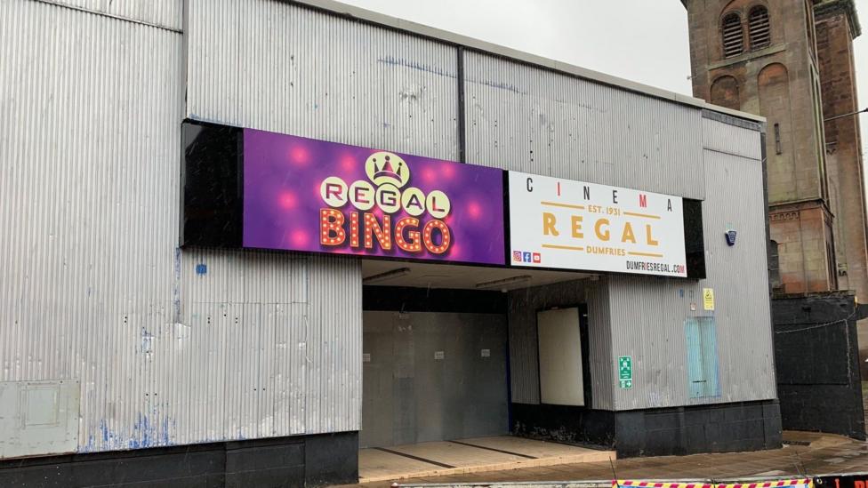 The front of Dumfries cinema with a corrugated frontage and signs for Regal Bingo and the Regal cinema