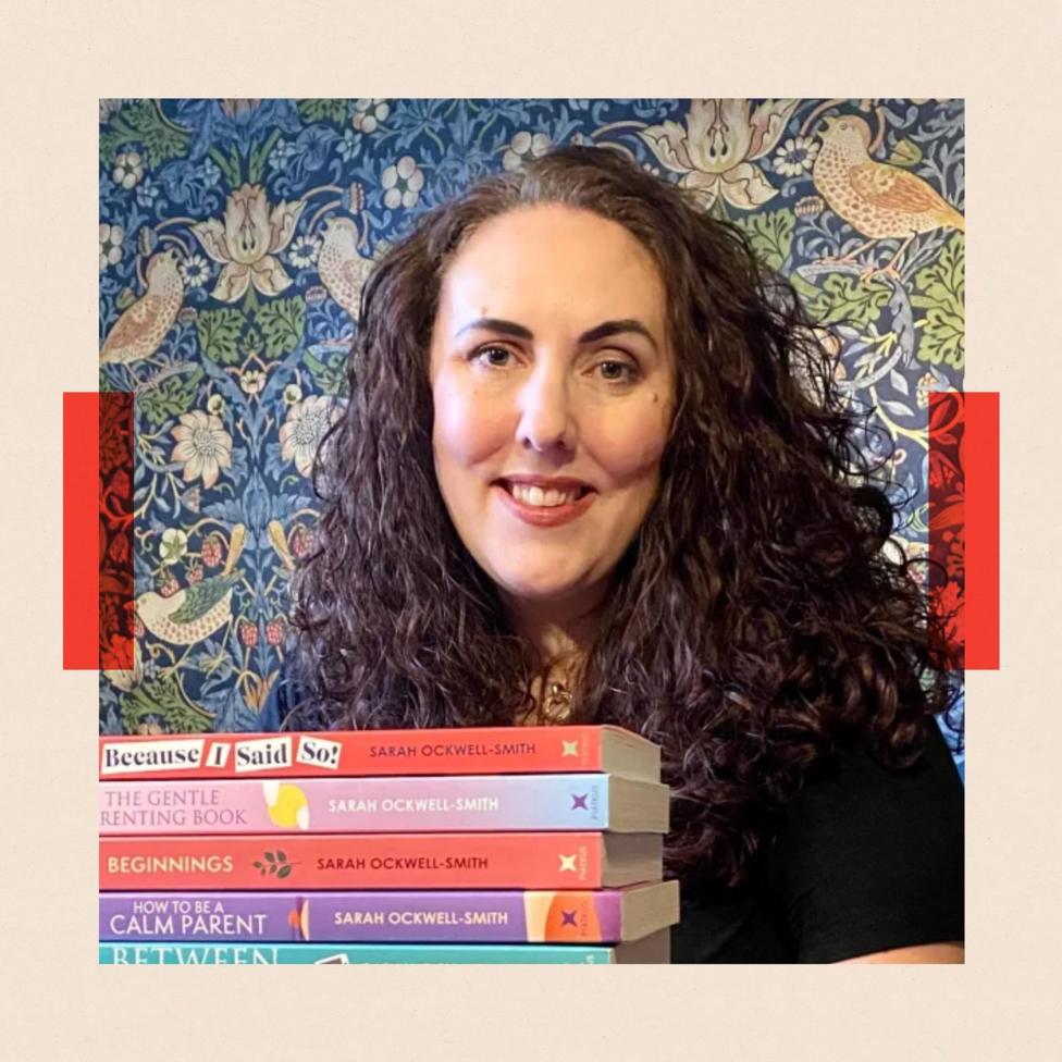 Sarah Ockwell-Smith poses with a collection of her books