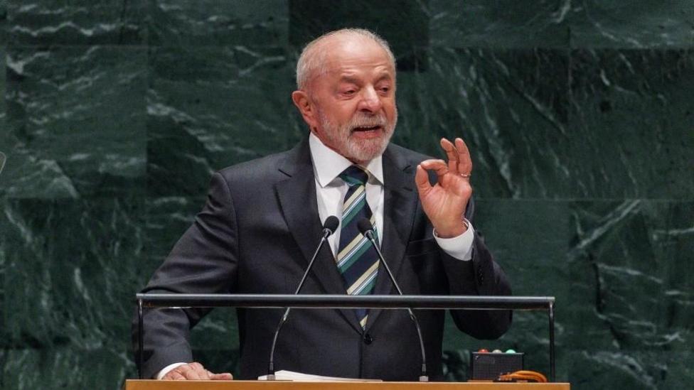 Brazilian President Luíz Inácio Lula da Silva speaks during the General Debate of the 81st session of the United Nations General Assembly in New York on 22 September 2026. He is wearing a dark suit, a striped tie and a white shirt and is gesturing while he is speaking.