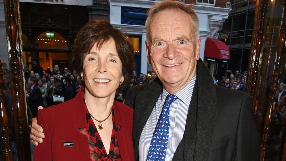 Lord and Lady Archer photographed in 2015. Lord Archer's arm is round his wife's shoulders.