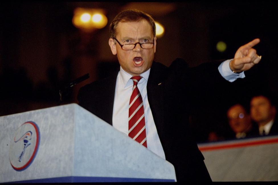 Jeffrey Archer at the podium at the Conservative party conference