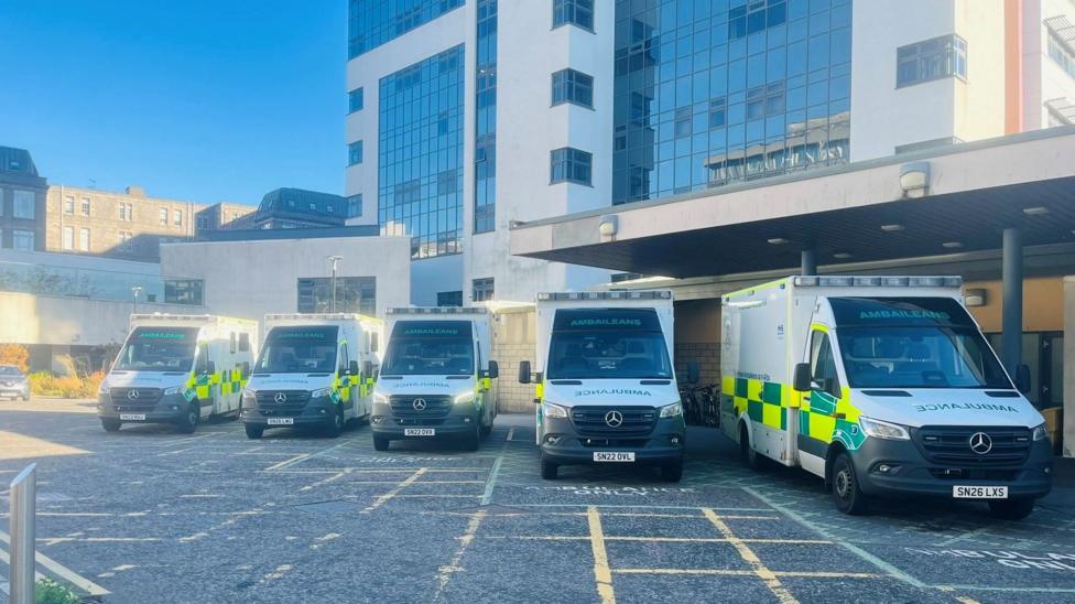 Five ambulances lined up outside Aberdeen Royal Infirmar.