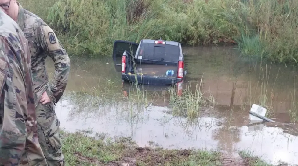A truck is submerged in Florida flood waters