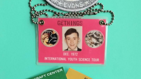 Gethings's pass from the trip. It is pink and says 'GETHINGS DEC 1972 INTERNATIONAL YOUTH SCIENCE TOUR'.