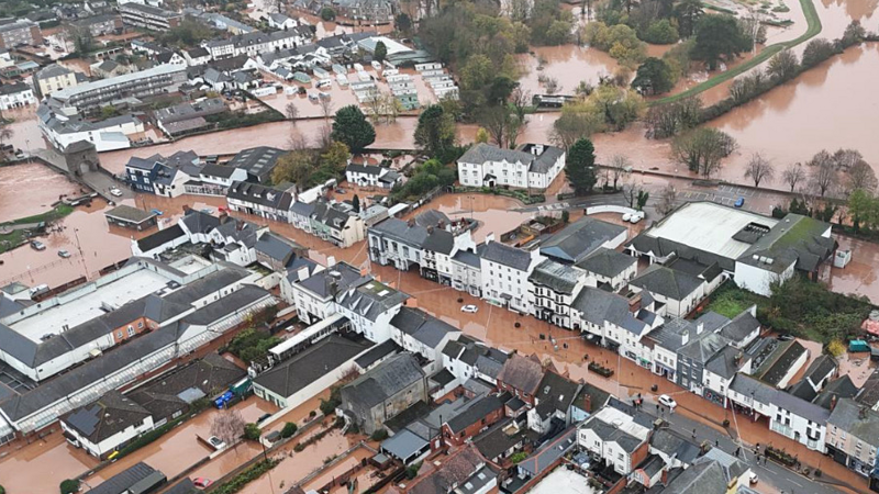 Ariel view of Monmouth. Brown water flooding the town