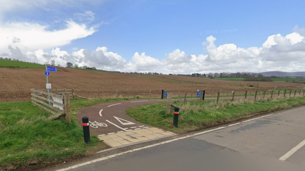A cycle path next to a road in rural Dumfries and Galloway