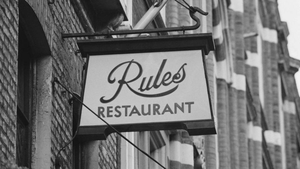black and white image of the Rules sign