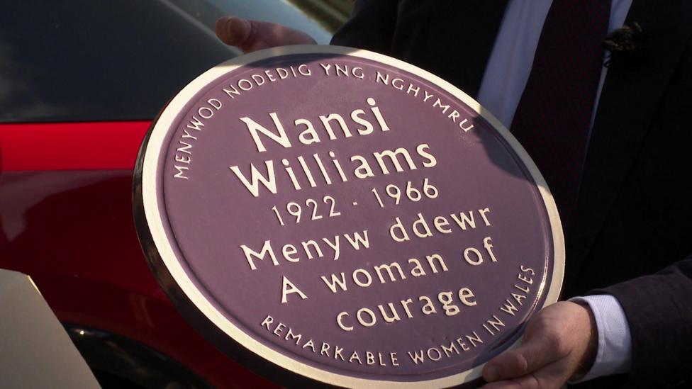 The purple plaque that will be placed near the cemetery