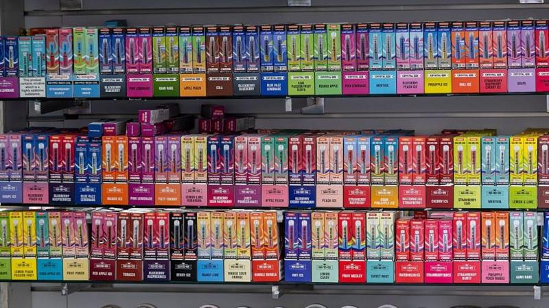 An array of dozens of colourful vapes in different flavours are seen on display in a shop in London earlier this year