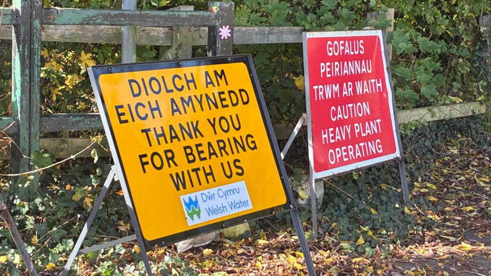 Welsh Water signs warning people about the work at the sewage plant in Hailey Park.