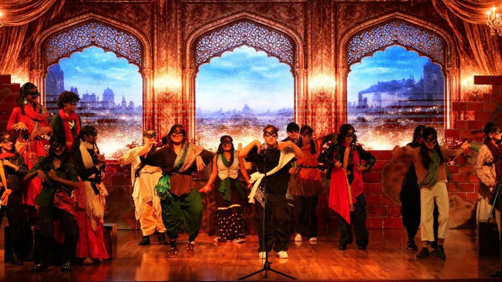 Children wearing costumes during a stage performance at Harrow School, Bengaluru.