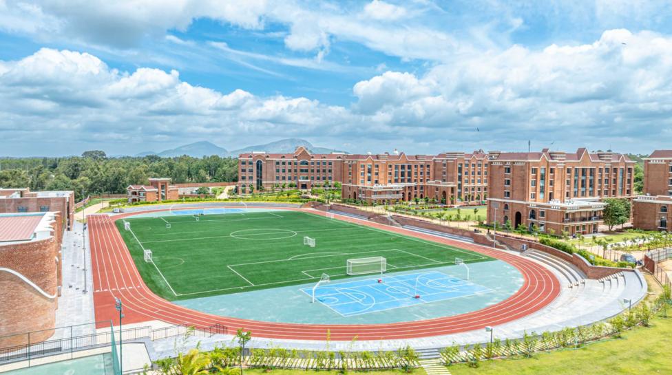 A view of the Harrow School, Bengaluru with its expansive football field and running track.