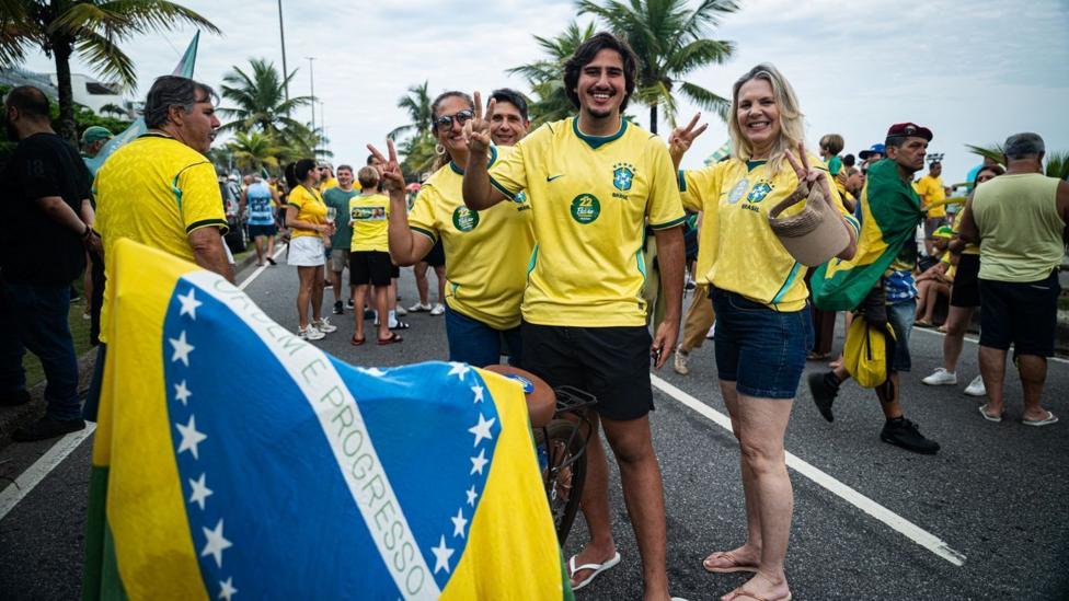 Bolsonaro supporters smile for the camera 