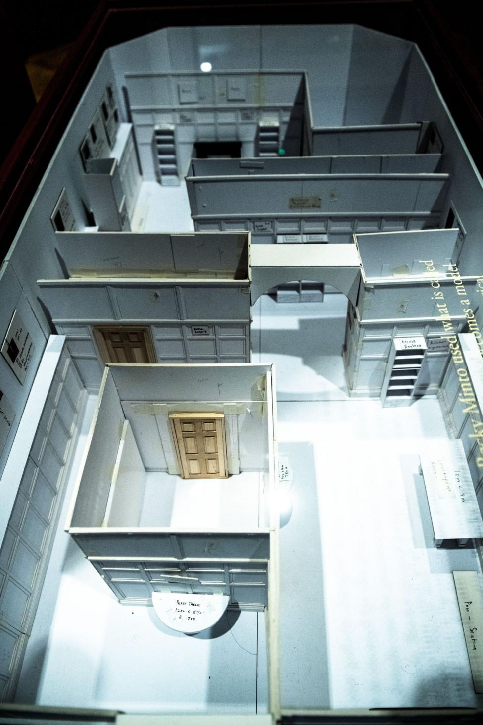A view down on to a scale model of the house in the art installation.