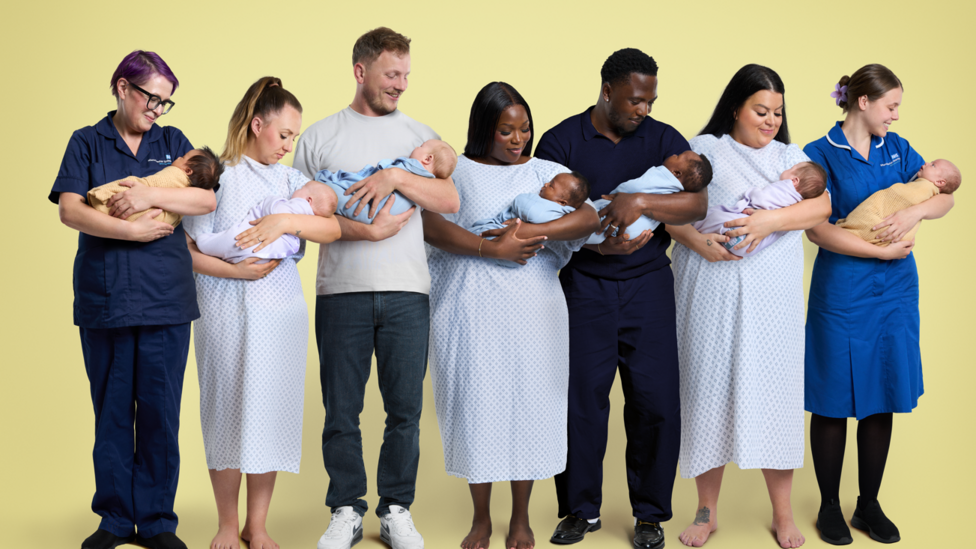 Pictured: Transitional care midwife Eleanor holding a baby, mother Erin with her baby, father Will with his baby, mother Peace with her baby, father Kwamdeen with his baby, mother Billie with her baby and midwife Ellie with a baby.