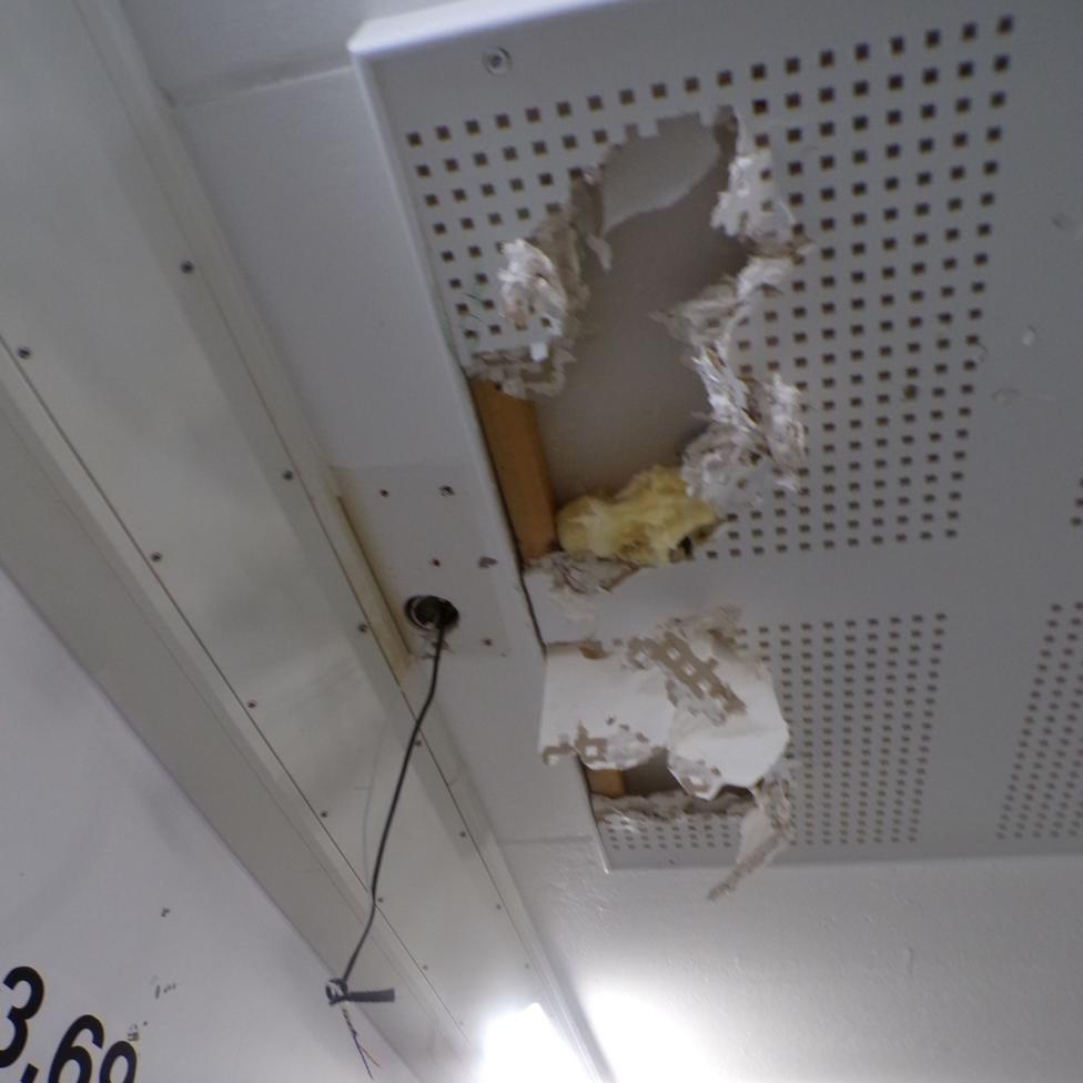 A damaged ceiling panel at HMP Polmont following a riot in September.